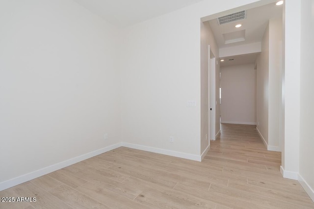 1254 E Penedes Dr, Gilbert, AZ 85298 - unfurnished room featuring light wood-style floors, baseboards, recessed lighting, and attic access