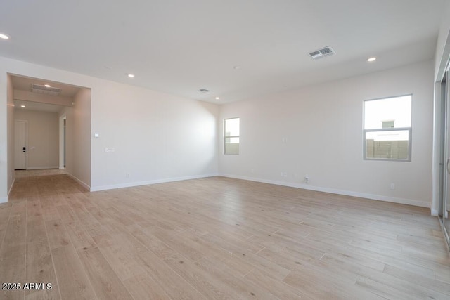 1254 E Penedes Dr, Gilbert, AZ 85298 - empty room with light wood-type flooring, baseboards, and recessed lighting