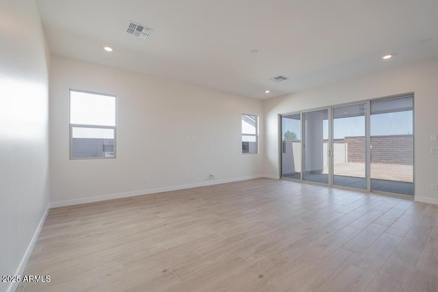 1254 E Penedes Dr, Gilbert, AZ 85298 - unfurnished room featuring light wood-style flooring, baseboards, and recessed lighting