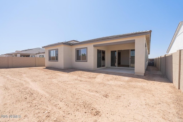 1254 E Penedes Dr, Gilbert, AZ 85298 - back of property featuring a patio area, a fenced backyard, and stucco siding
