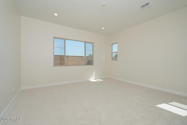 1254 E Penedes Dr, Gilbert, AZ 85298 - spare room with light carpet, baseboards, and recessed lighting