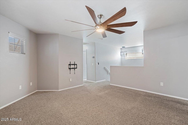 421 W Mountain Sage Dr, Phoenix, AZ 85045 - carpeted empty room featuring a ceiling fan, plenty of natural light, and baseboards