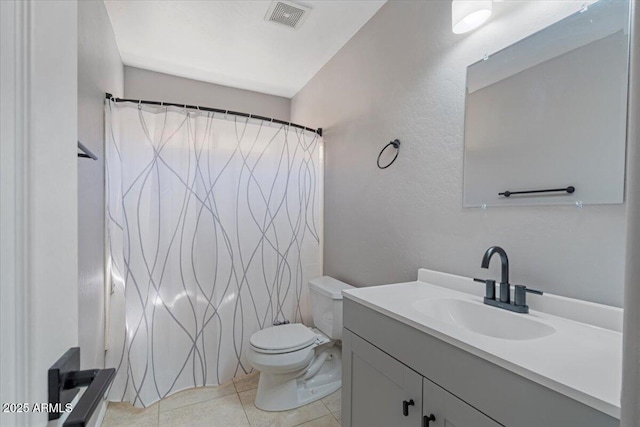 421 W Mountain Sage Dr, Phoenix, AZ 85045 - full bath featuring vanity, toilet, curtained shower, tile patterned flooring, and a textured wall