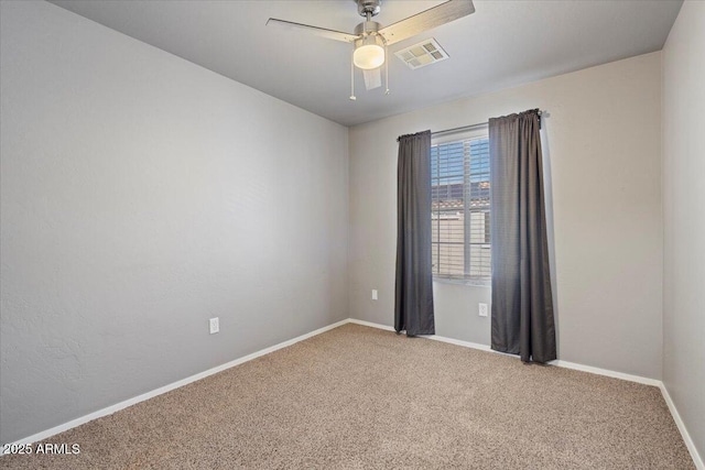421 W Mountain Sage Dr, Phoenix, AZ 85045 - carpeted empty room featuring baseboards and a ceiling fan