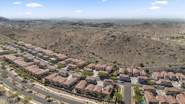 421 W Mountain Sage Dr, Phoenix, AZ 85045 - aerial view of property and surrounding area featuring a mountain backdrop, nearby suburban area, and a desert landscape