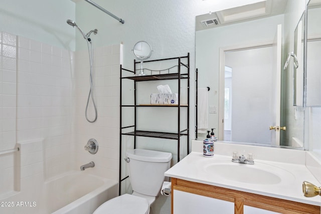 full bath featuring visible vents, a textured wall, toilet, vanity, and  shower combination