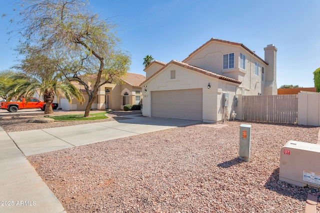 mediterranean / spanish-style home with a garage, a tile roof, fence, driveway, and stucco siding