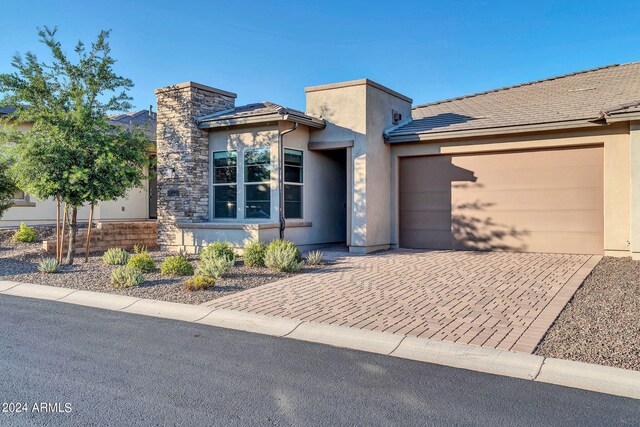 kitchen with stainless steel appliances, visible vents, open floor plan, decorative backsplash, and wall chimney exhaust hood