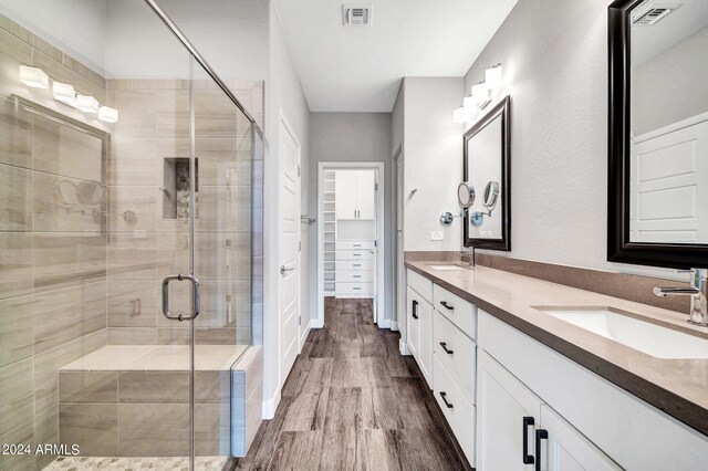 bedroom with ceiling fan, baseboards, and wood finished floors