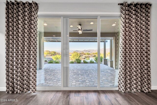 view of patio / terrace with a water view and a pergola