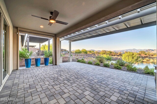 back of property with a pergola, a patio, and stucco siding