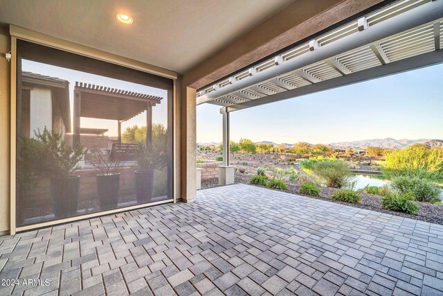 drone / aerial view with a residential view and a water and mountain view