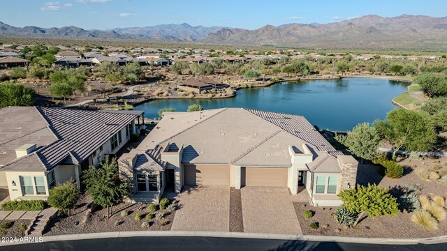 aerial view featuring a residential view and a water and mountain view