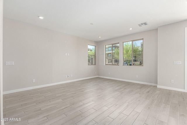 9366 E Sequence Ave, Mesa, AZ 85212 - spare room featuring light wood finished floors and recessed lighting
