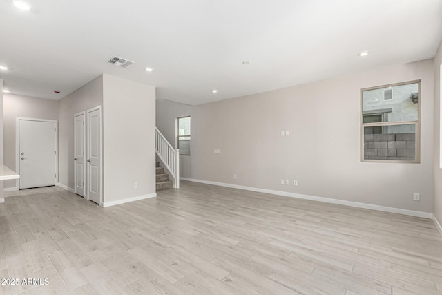 9366 E Sequence Ave, Mesa, AZ 85212 - unfurnished room featuring light wood-style flooring, stairs, and recessed lighting