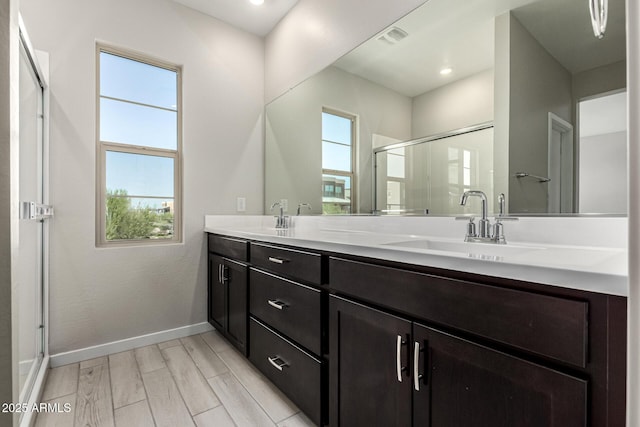 9366 E Sequence Ave, Mesa, AZ 85212 - full bath featuring double vanity, a shower stall, wood finished floors, and recessed lighting
