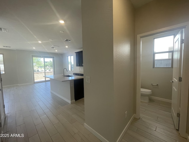 9366 E Sequence Ave, Mesa, AZ 85212 - corridor with light wood-style floors and recessed lighting