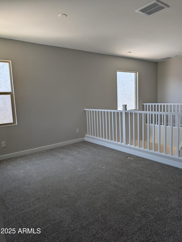 9366 E Sequence Ave, Mesa, AZ 85212 - carpeted spare room with baseboards