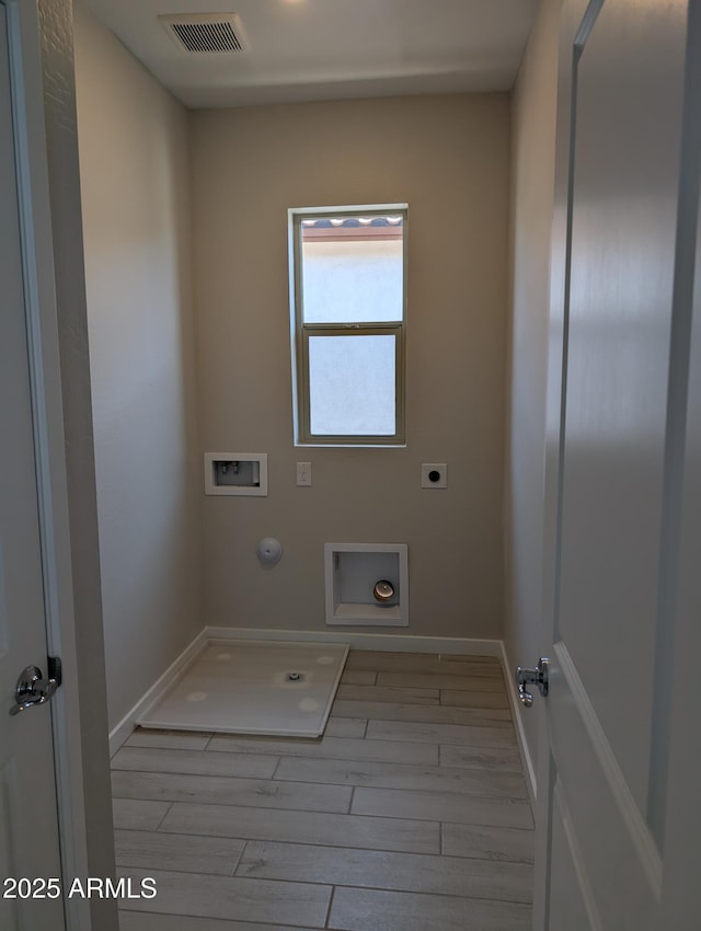 9366 E Sequence Ave, Mesa, AZ 85212 - laundry area with electric dryer hookup, hookup for a washing machine, wood finished floors, and gas dryer hookup