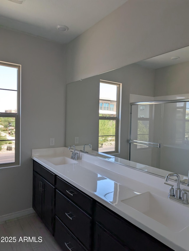 9366 E Sequence Ave, Mesa, AZ 85212 - bathroom featuring double vanity and a stall shower