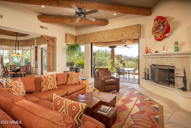 tiled living room with beam ceiling, a premium fireplace, and ceiling fan