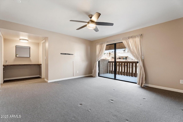 spare room with ceiling fan and carpet flooring