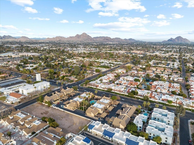 birds eye view of property featuring a mountain view