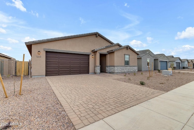 ranch-style home with a garage