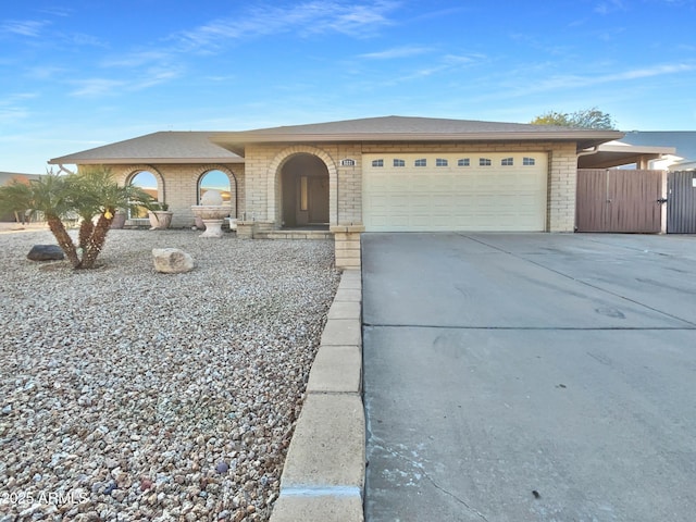 single story home featuring a garage