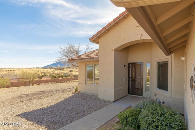 property entrance featuring a mountain view