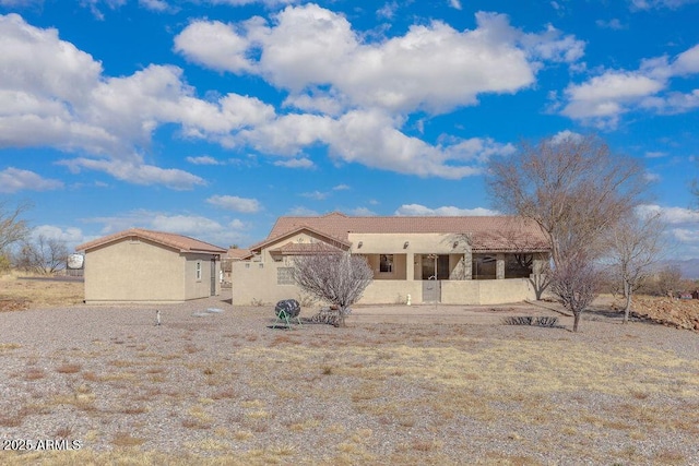 view of pueblo revival-style home