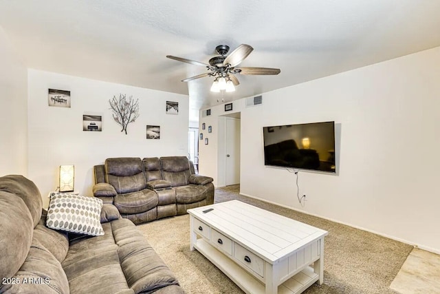 3553 W El Camino Dr, Phoenix, AZ 85051 - living area with a ceiling fan and light carpet