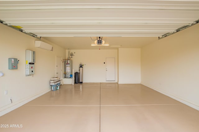 garage with gas water heater and baseboards