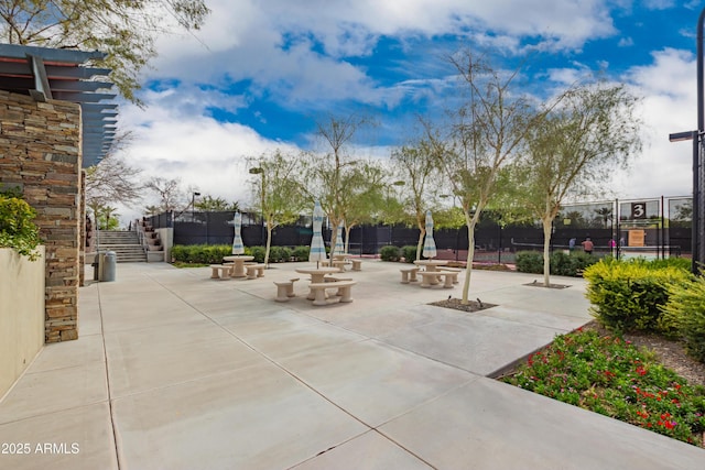 view of patio / terrace featuring fence