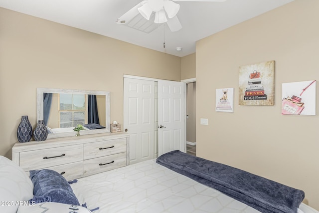 bedroom with a closet and a ceiling fan