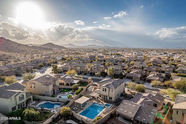 bird's eye view with a mountain view and a residential view