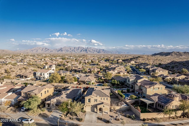 birds eye view of property with a residential view and a mountain view