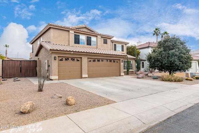 mediterranean / spanish-style home featuring a garage