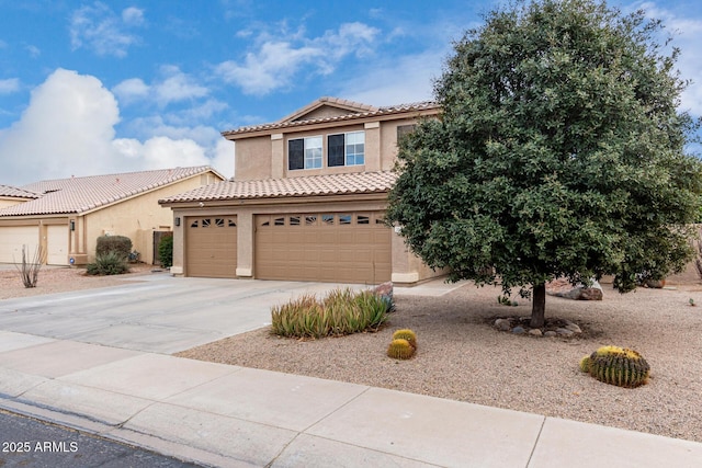 mediterranean / spanish-style house featuring a garage