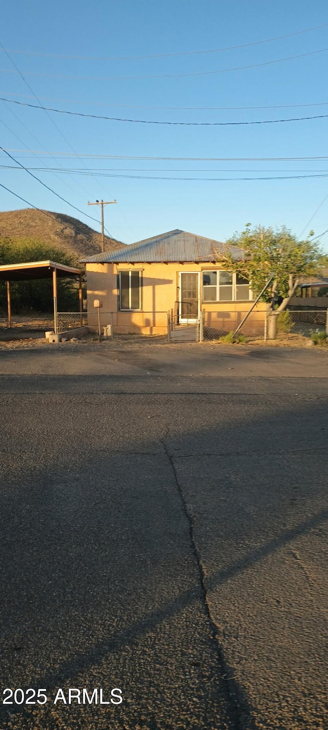 ranch-style home with stucco siding
