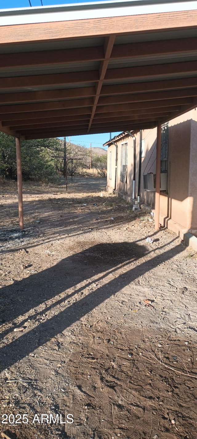 view of yard featuring a carport
