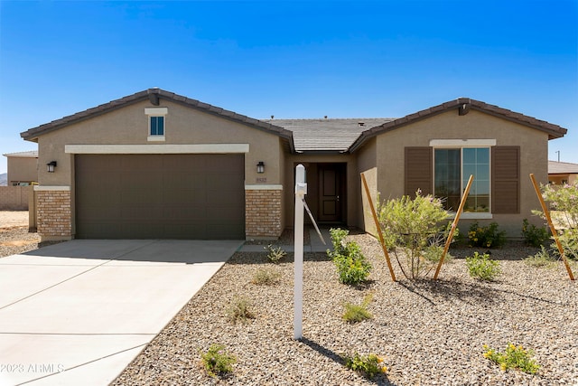 ranch-style home with a garage