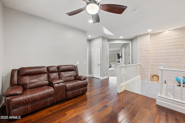 living room with hardwood / wood-style floors, ceiling fan, baseboards, and recessed lighting