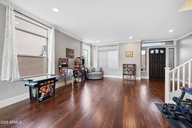 entryway with baseboards, recessed lighting, crown molding, and hardwood / wood-style flooring