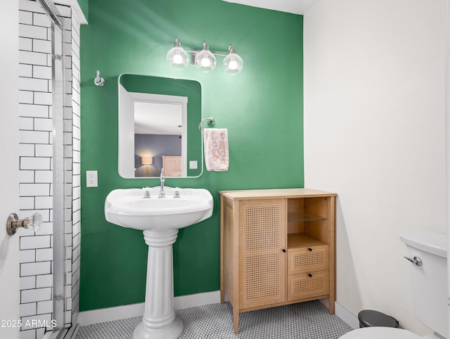 7726 W Cameron Dr, Peoria, AZ 85345 - bathroom with baseboards and toilet