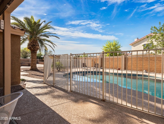 7726 W Cameron Dr, Peoria, AZ 85345 - view of swimming pool with a patio area, a fenced backyard, and a fenced in pool