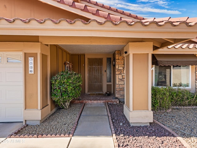 7726 W Cameron Dr, Peoria, AZ 85345 - entrance to property with stone siding and a tile roof