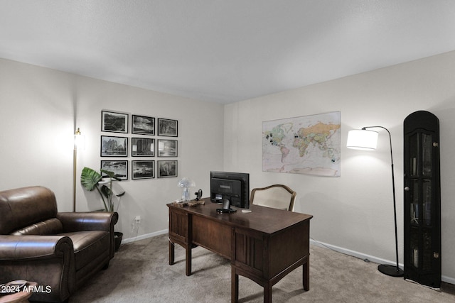 home office featuring carpet flooring