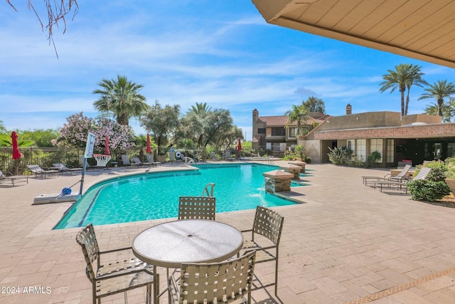 view of pool with a patio area