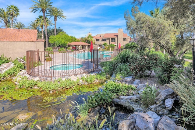 view of swimming pool featuring a patio